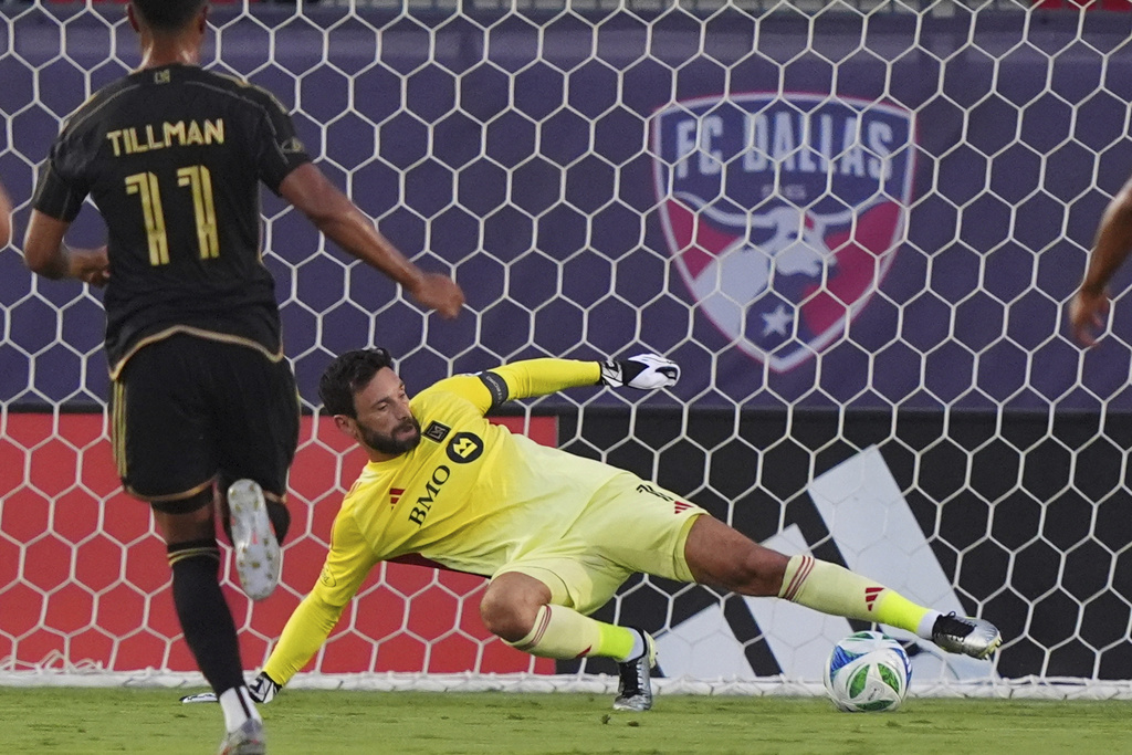 Los Angeles FC goalkeeper Hugo Lloris (1) allows a goal by FC Dallas forward Logan Farrington (not shown) during the first half of an MLS soccer match in Frisco, Texas, Saturday, Aug. 23, 2025. (AP Photo/LM Otero)