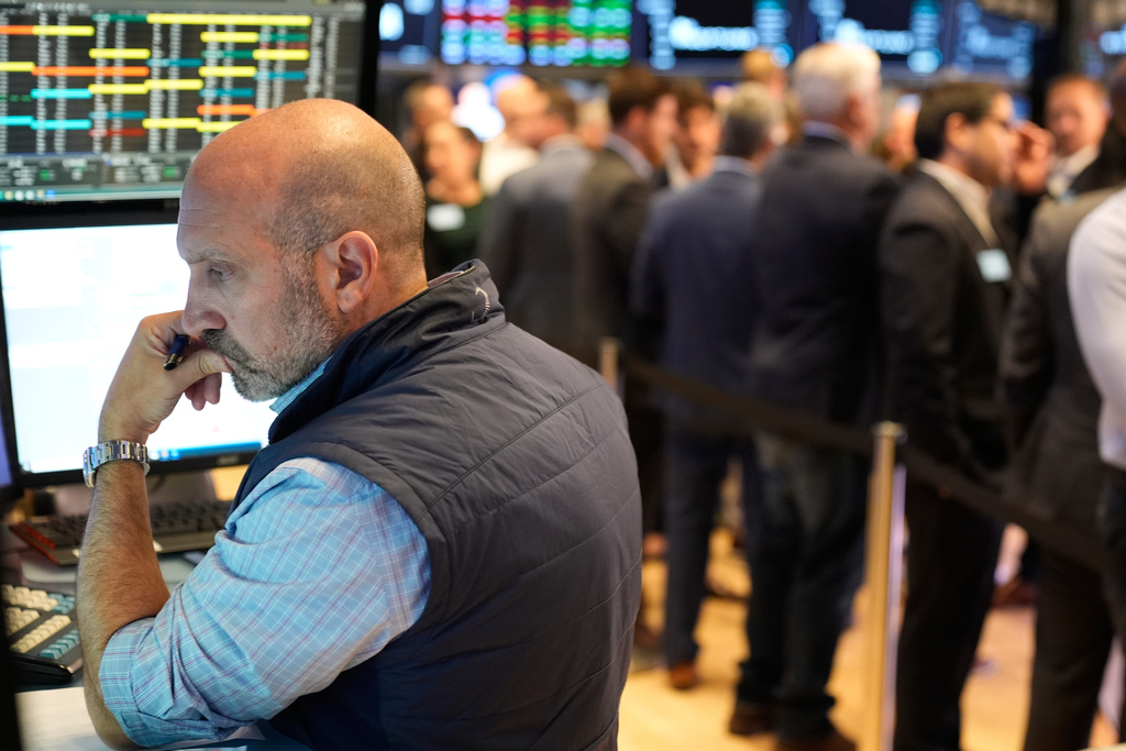James Denaro works on the floor at the New York Stock Exchange in New York, Wednesday, Oct. 1, 2025. (AP Photo/Seth Wenig)