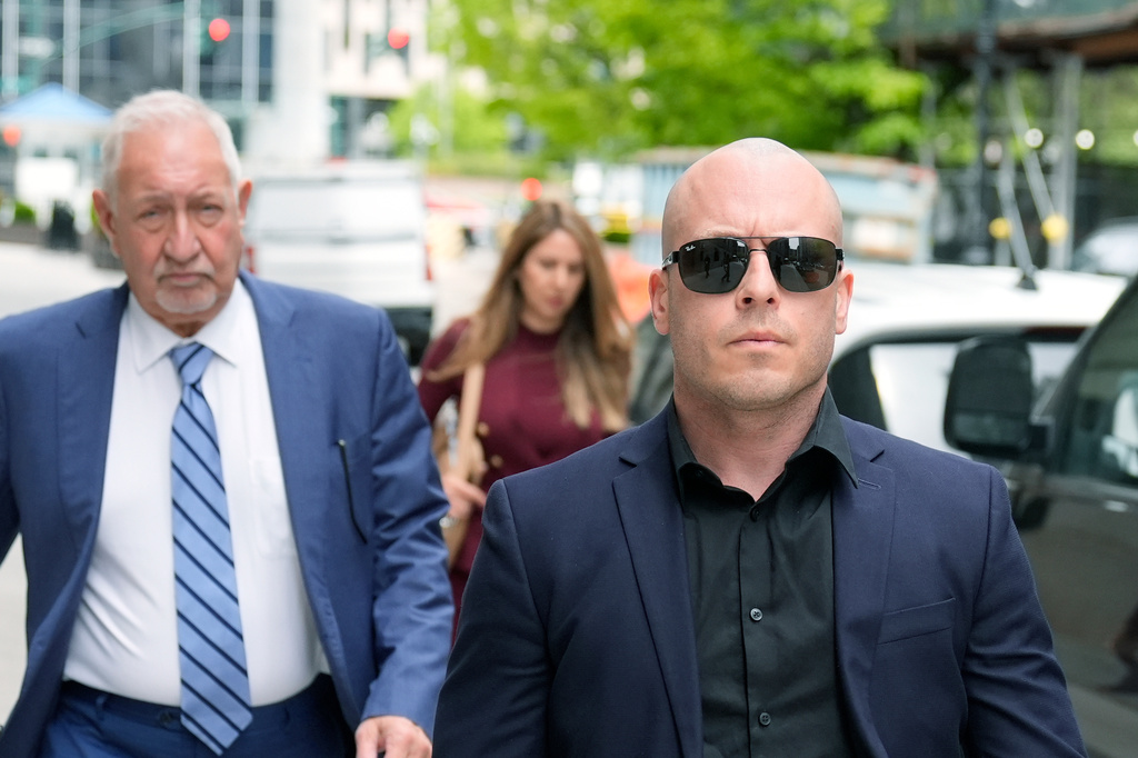 Gannon Ken Van Dyke, right, walks with his attorneys near a federal court building in New York on Tuesday, April 28, 2026. (AP Photo/Seth Wenig)