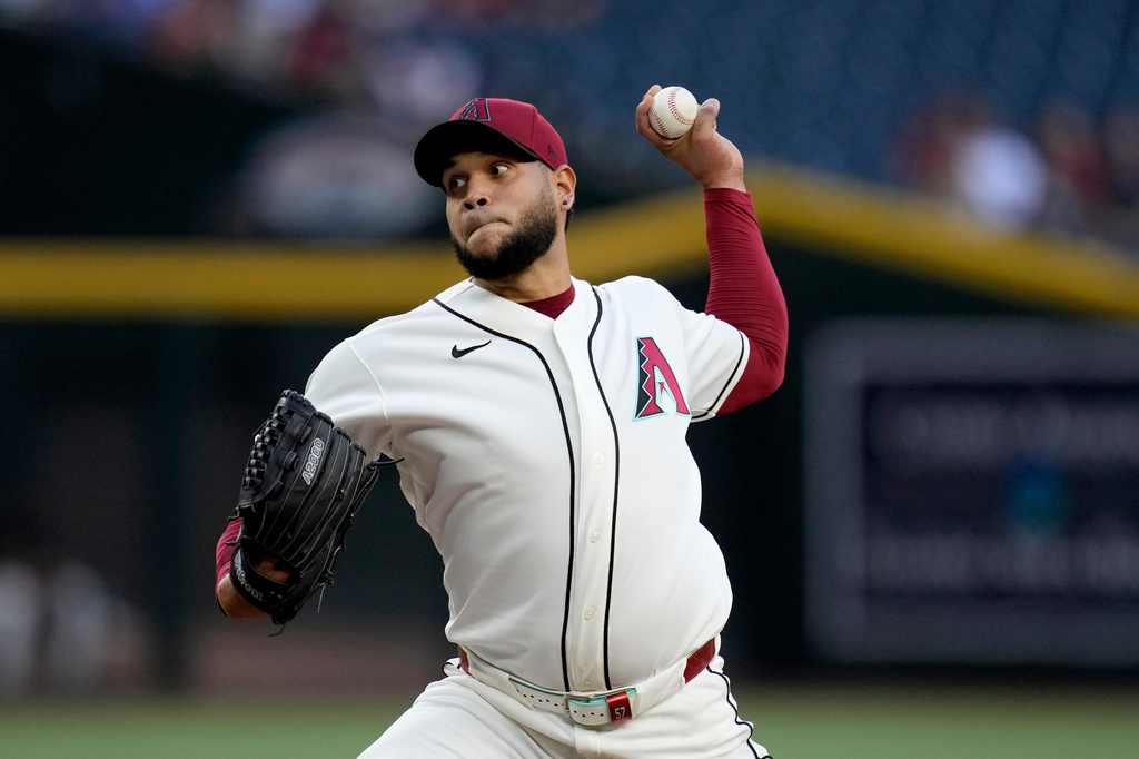 Arizona Diamondbacks pitcher Eduardo Rodriguez throws against the Colorado Rockies during the first inning of a baseball game, Thursday, May 21, 2026, in Phoenix. (AP Photo/Ross D. Franklin)