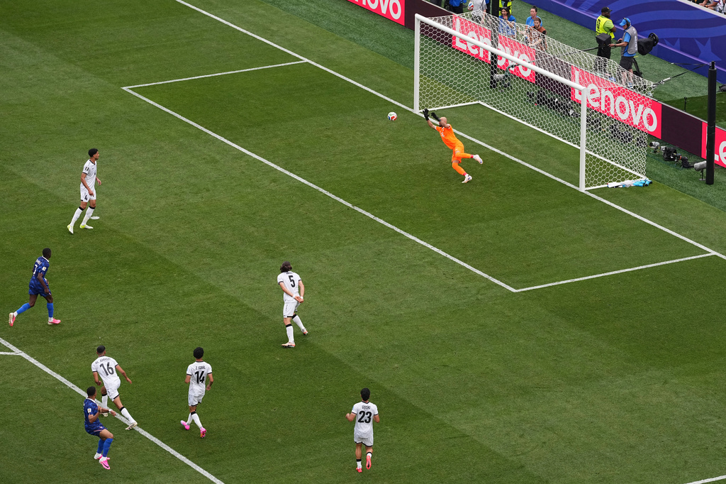 France's Kylian Mbappe scores his side's opening goal against Iraq during the World Cup Group I soccer match in Philadelphia, Monday, June 22, 2026. (AP Photo/Matt Rourke)