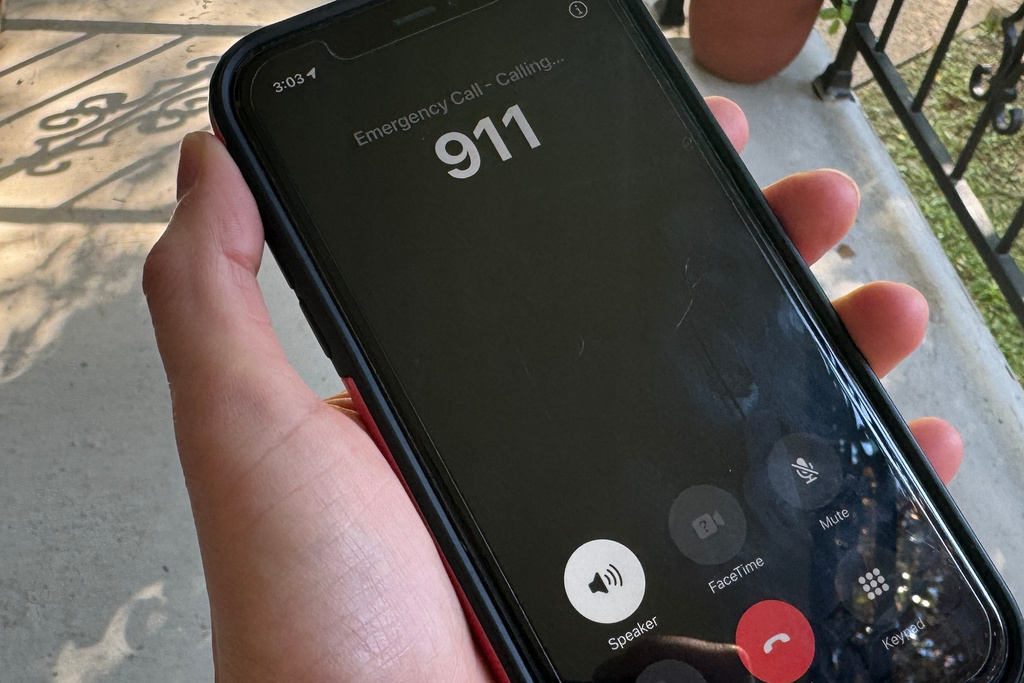 This photo taken Sept. 25, 2025, in Jackson, Miss. shows a blank screen on a phone while making a 911 call which resulted in a dial tone, during a 911 systems outage across Mississippi and Louisiana. (AP Photo/Sophie Bates)