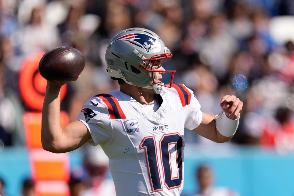 New England Patriots quarterback Drake Maye (10) throws during the second half of an NFL football game against the Tennessee Titans, Sunday, Oct. 19, 2025, in Nashville, Tenn. (AP Photo/George Walker IV)