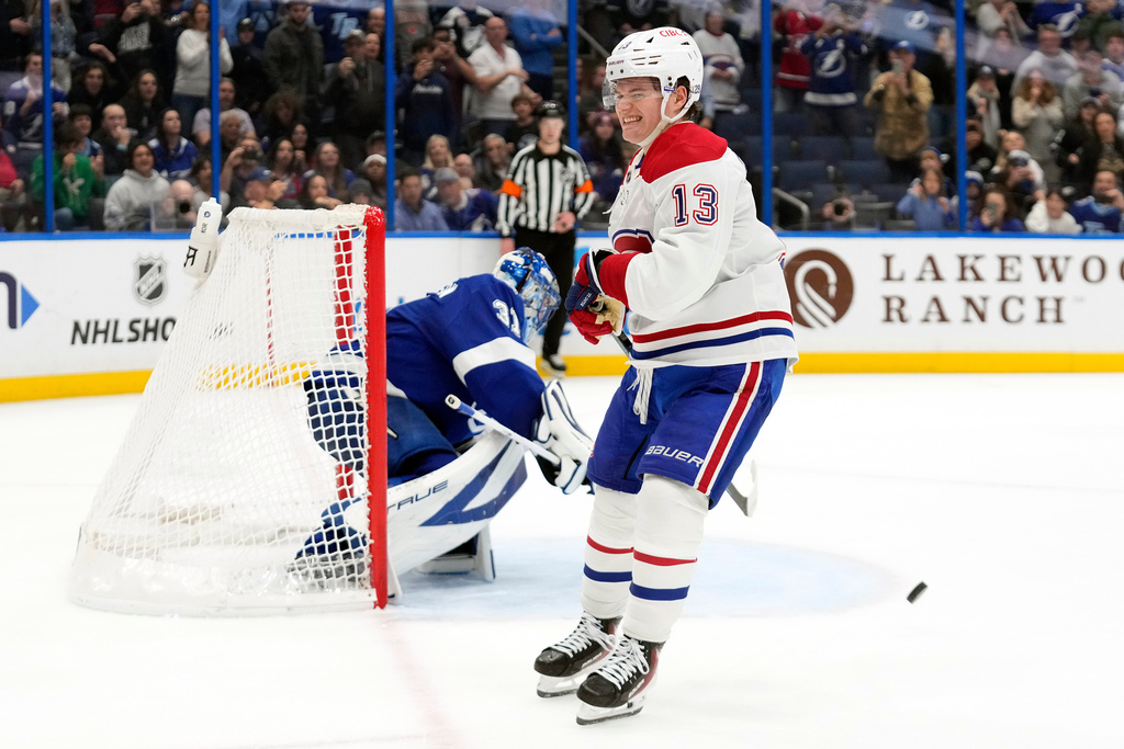 Montréal Canadiens right wing Cole Caufield (13) reacts after Tampa Bay Lightning goaltender Jonas Johansson (31) makes a save during a shootout in an NHL hockey game Sunday, Dec. 28, 2025, in Tampa, Fla. (AP Photo/Chris O'Meara)