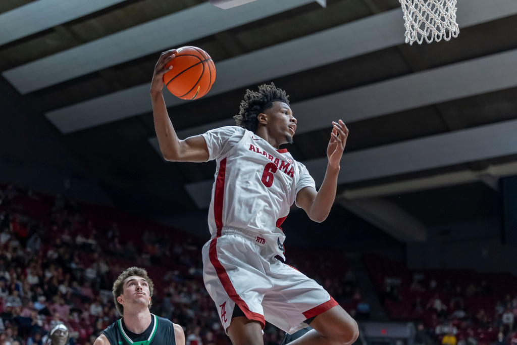 Alabama forward London Jemison (6) rebounds the ball against North Dakota during during the first half of an NCAA college basketball game on Monday, Nov. 3, 2025, in Tuscaloosa, Ala. (AP Photo/Vasha Hunt)