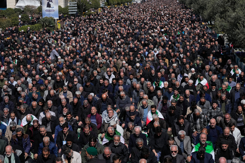 Iranians attend Friday prayers in the courtyard of the Imam Khomeini Grand mosque in Tehran, Iran, Friday, March 6, 2026. (AP Photo/Vahid Salemi)