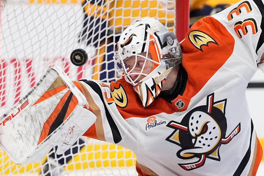 Anaheim Ducks goaltender Ville Husso (33) watches a goal is scored during the second period of an NHL hockey game against the Nashville Predators, Thursday, April 16, 2026, in Nashville, Tenn. (AP Photo/George Walker IV)