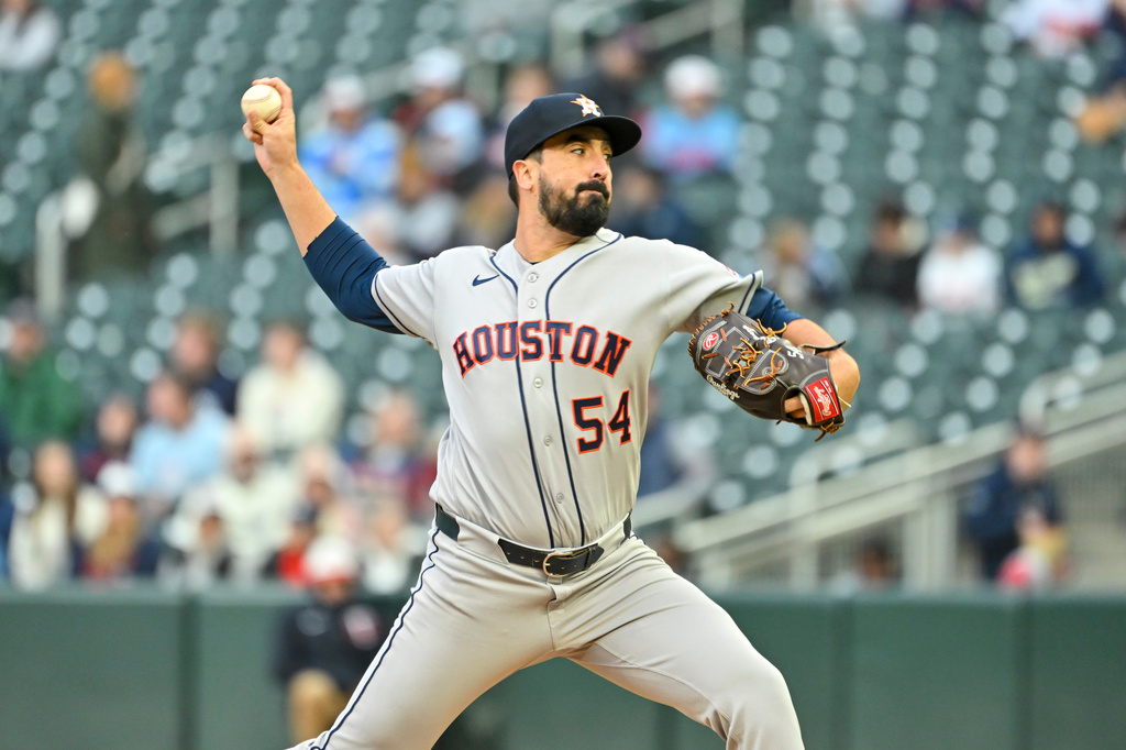 Houston Astros pitcher Jason Alexander (54) throws against the Minnesota Twins during the first inning of a baseball game Tuesday, May 19, 2026, in Minneapolis. (AP Photo/Craig Lassig)