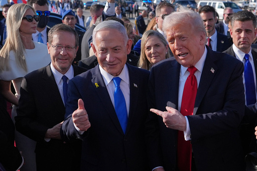 President Donald Trump poses for a photo with Israel's Prime Minister Benjamin Netanyahu before he boards Air Force One at Ben Gurion International Airport, Monday, Oct. 13, 2025, near Tel Aviv, as Israel's President Isaac Herzog, left, watches. (AP Photo/Evan Vucci) President Donald Trump poses for a photo with Israel's Prime Minister Benjamin Netanyahu before he boards Air Force One at Ben Gurion International Airport, Monday, Oct. 13, 2025, near Tel Aviv, as Israel's President Isaac Herzog, left, watches. (AP Photo/Evan Vucci)