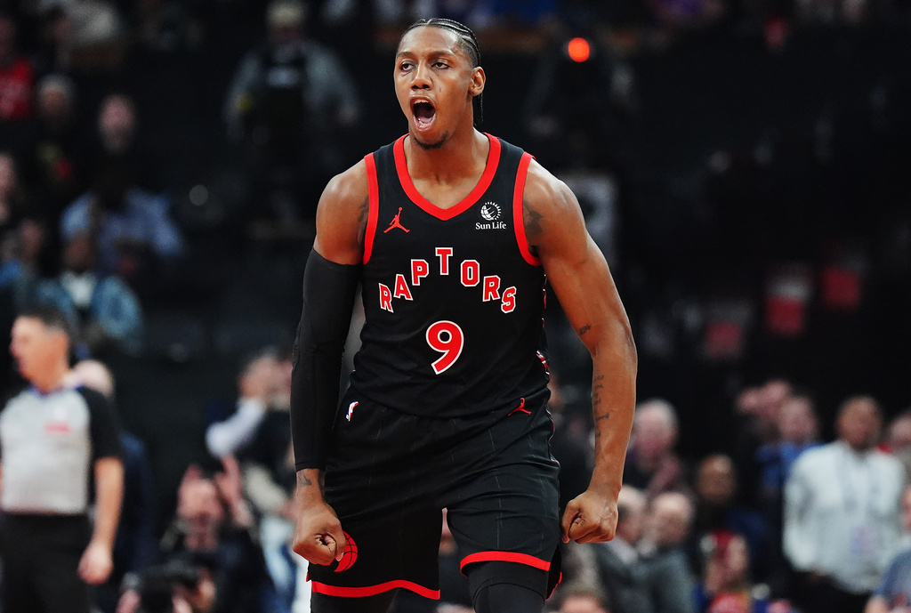 Toronto Raptors' RJ Barrett (9) celebrates a basket against the Cleveland Cavaliers during the first half of an NBA playoff basketball game in Toronto on Thursday, April 23, 2026. (Nathan Denette/The Canadian Press via AP)