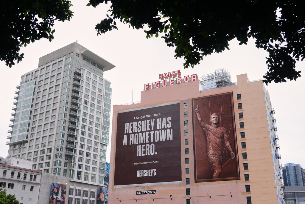 A billboard featuring U.S. soccer player Christian Pulisic is pictured on the side of the Hotel Figueroa, Monday, June 29, 2026, in Los Angeles. (AP Photo/Chris Pizzello)