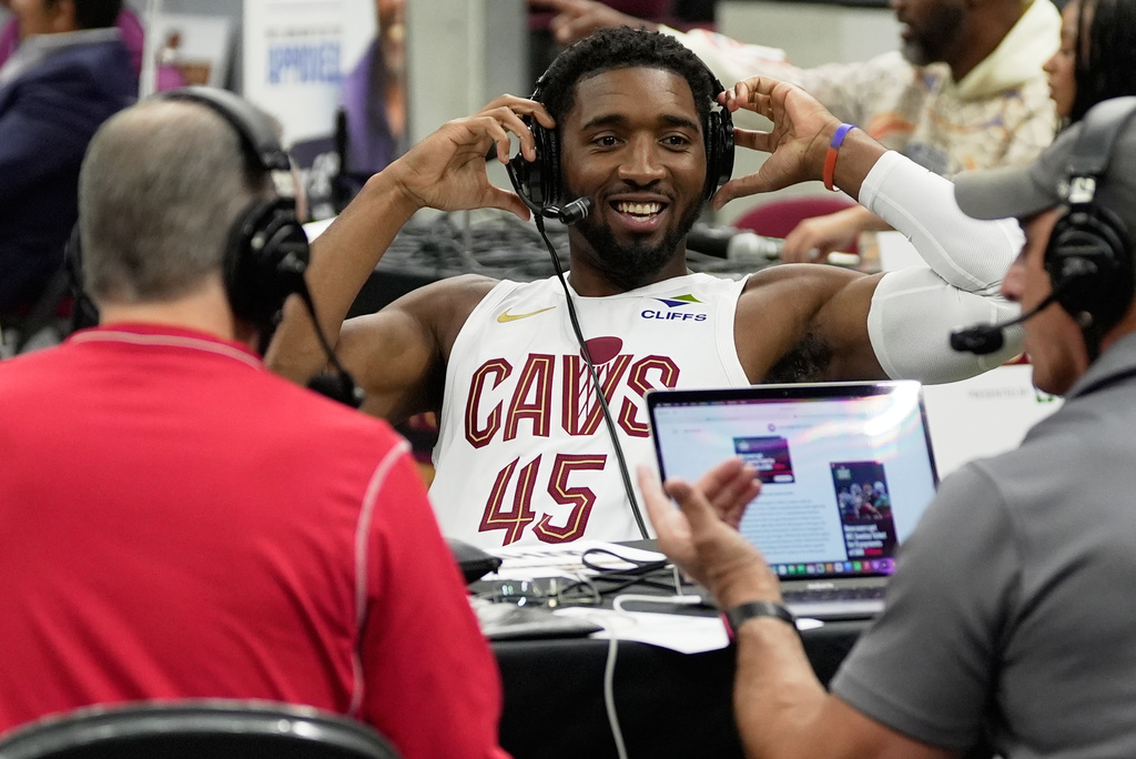 Cleveland Cavaliers' Donovan Mitchell is interviewed during the NBA basketball team's media day, Monday, Sept 28, 2026, in Cleveland. (AP Photo/Sue Ogrocki)