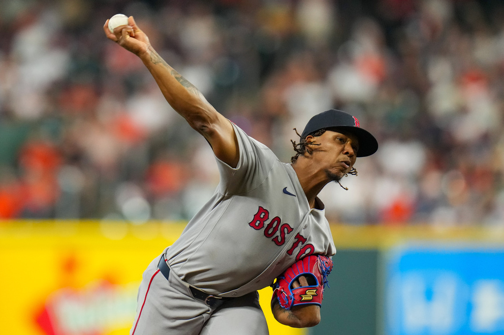 Boston Red Sox starting pitcher Brayan Bello delivers during the first inning of a baseball game against the Houston Astros in Houston, Tuesday, March 31, 2026. (AP Photo/Jon Shapley)