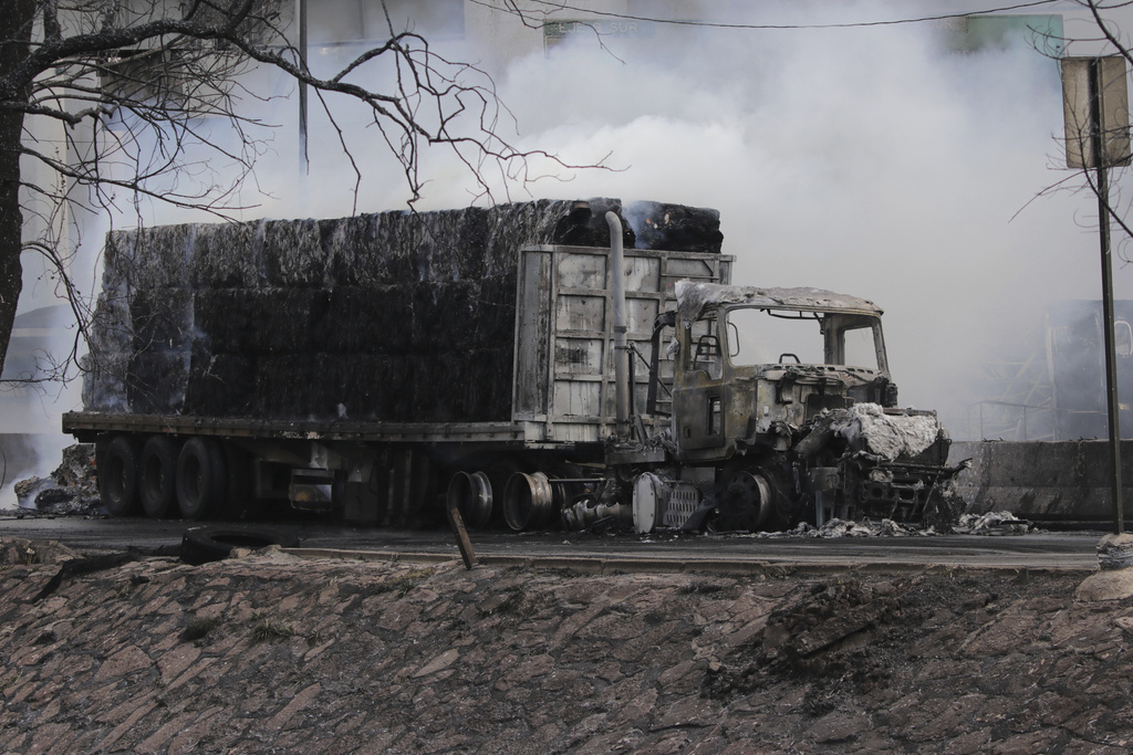 A damaged truck sits at the scene of a gas tanker explosion in Mexico City, Wednesday, Sept. 10, 2025. (AP Photo/Tristan Velazquez)