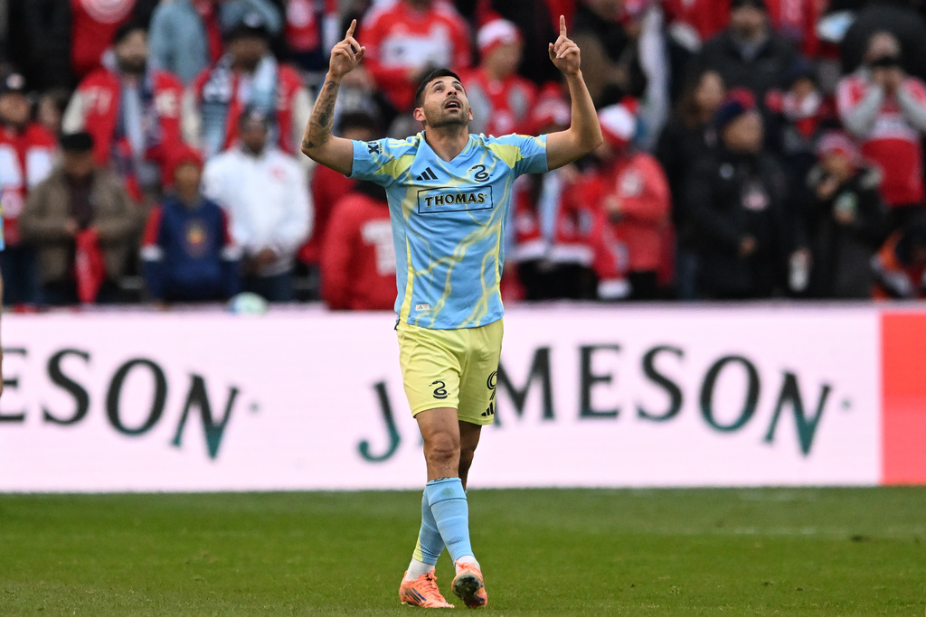 Philadelphia Union's Tai Baribo celebrates after scoring a goal during the first half of an MLS soccer playoff match against the Chicago Fire, Saturday, Nov. 1, 2025, in Bridgeview, Ill. (AP Photo/Paul Beaty)