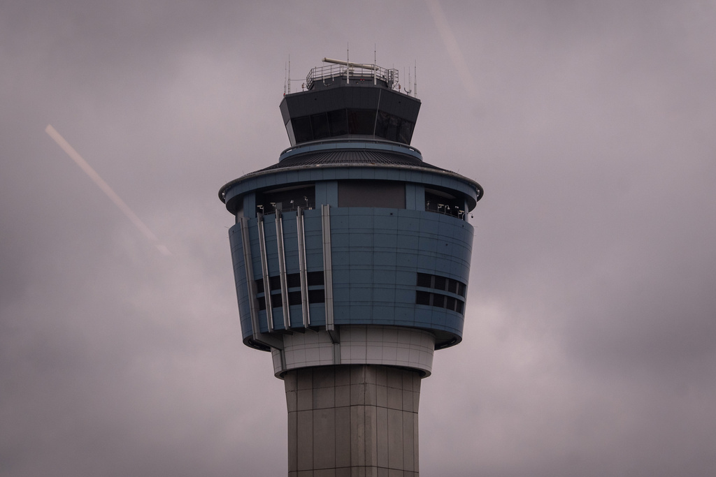 The FAA Air Traffic Control tower at LaGuardia Airport (LGA), in the Queens borough of New York, Sunday, Nov. 9, 2025. (AP Photo/Adam Gray)