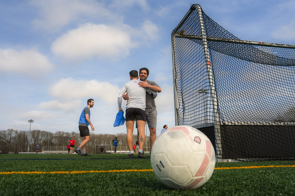 People play soccer at Stony Brook University in Stony Brook, N.Y., Friday, April 3, 2026. (AP Photo/Ryan Murphy)