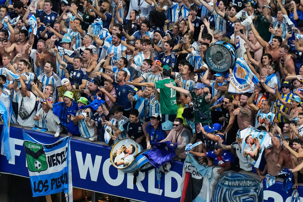 Fans of Argentina celebrate after they defeated England in their World Cup semifinal soccer match in Atlanta, Wednesday, July 15, 2026. (AP Photo/Lynne Sladky)