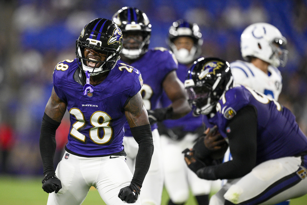 Baltimore Ravens cornerback Marquise Robinson (28) reacts after making a hit on Indianapolis Colts running back Ulysses Bentley IV, not visible, during the second half of an NFL preseason football game Thursday, Aug. 7, 2025, in Baltimore. (AP Photo/Nick Wass)