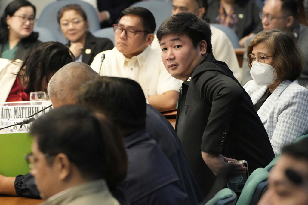 Former Department of Public Works and Highways engineer Brice Ericson Hernandez sits during investigations on flood-control projects at the Senate Blue Ribbon committee in Pasay city, Philippines on Monday, Sept. 8, 2025. (AP Photo/Aaron Favila)