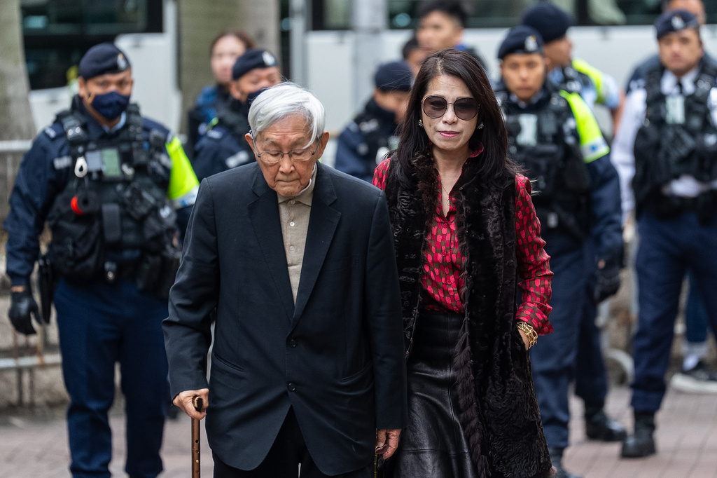 Retired Chinese cardinal Joseph Zen Ze-Kiun, left, and Jimmy Lai's wife Teresa Lai arrive at the West Kowloon Magistrates' Courts ahead of the sentencing for former Hong Kong publisher Jimmy Lai n Hong Kong, Monday, Feb. 9, 2026. (AP Photo/Chan Long Hei)
