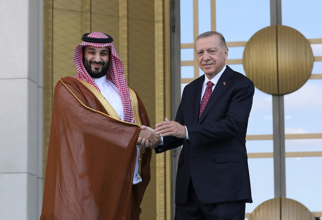 FILE - Turkish President Recep Tayyip Erdogan, right, and Saudi Crown Prince Mohammed bin Salman shake hands during a welcome ceremony, in Ankara, Turkey, Wednesday, June 22, 2022. (AP Photo/Burhan Ozbilici, File)