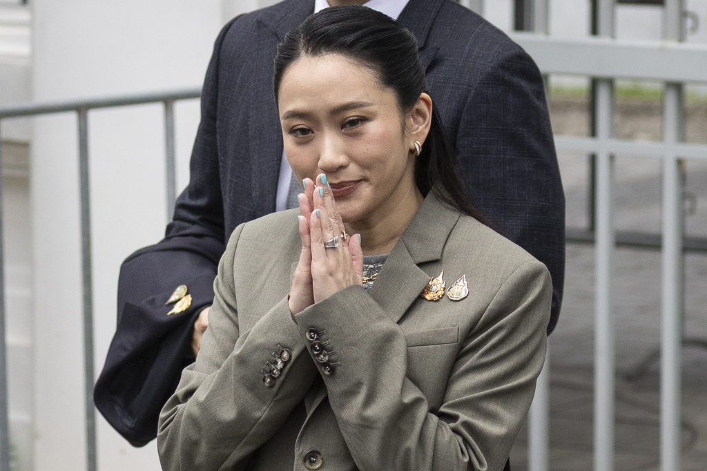 Former Prime Minister Paetongtarn Shinawatra, daughter of former Prime Minister Thaksin Shinawatra leaves the Supreme Court in Bangkok, Thailand, Tuesday, Sept. 9, 2025. (AP Photo/Wason Wanichakorn)