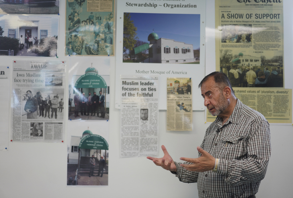 Imam Taha Tawil of "The Mother Mosque of America" discusses the building's long history in Cedar Rapids, Iowa, on Friday, Aug. 8, 2025. (AP Photo/Jessie Wardarski)