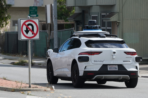A Waymo vehicle drives past a No U-Turn sign in San Bruno, Calif., Tuesday, Sept. 30, 2025. (AP Photo/Jeff Chiu) A Waymo vehicle drives past a No U-Turn sign in San Bruno, Calif., Tuesday, Sept. 30, 2025. (AP Photo/Jeff Chiu)