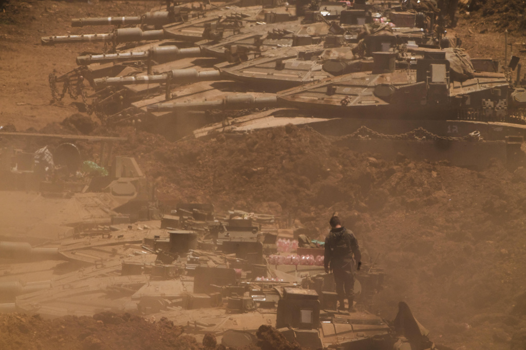 An Israeli soldier work on a tank near the border with Lebanon in northern Israel, Wednesday, July 1, 2026. (AP Photo/Ariel Schalit)