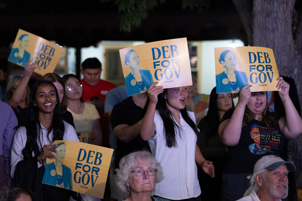Supporters of Democratic gubernatorial candidate Deb Haaland cheer her on during her speech during an primary election night watch party after winning the Democratic nomination Tuesday, June 2, 2026, in Albuquerque, New Mexico. (AP Photo/Jon Austria)