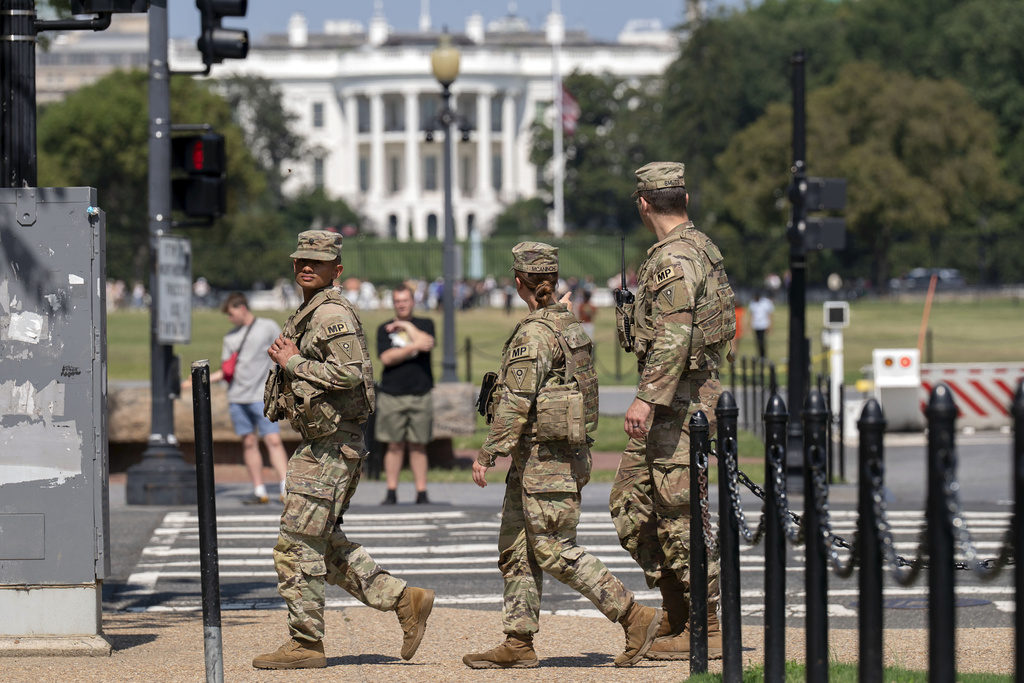 Members of the Ohio National Guard patrol the National Mall, Sunday, Sept. 14, 2025, in Washington. (AP Photo/Jose Luis Magana)