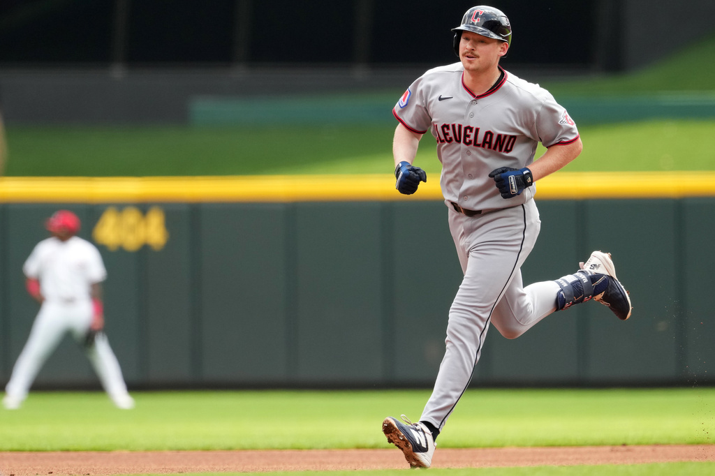 Cleveland Guardians' Kyle Manzardo rounds the bases after hitting a grand slam during the first inning in the first baseball game of a doubleheader against the Cincinnati Reds, Tuesday, July 28, 2026, in Cincinnati. (AP Photo/Kareem Elgazzar)