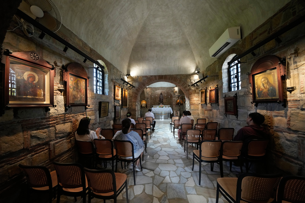Visitors pray inside the Ephesus House, a replica of the House of the Virgin Mary in Ephesus, Turkey, at Alfonso town, Cavite province, Philippines on July 16, 2026. (AP Photo/Aaron Favila)