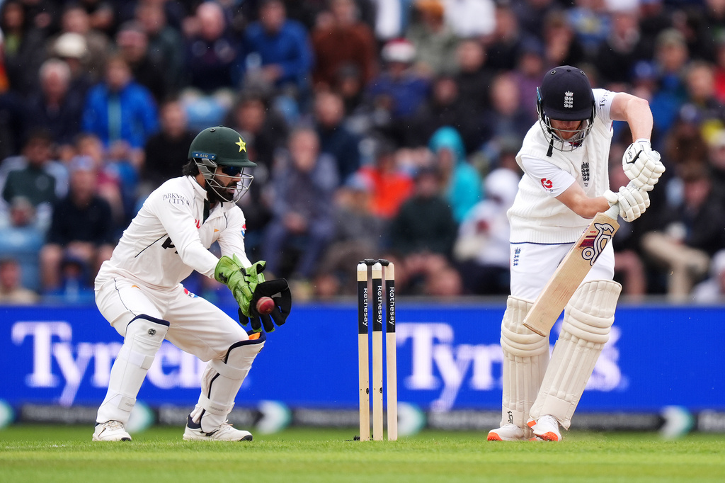 England's Jordan Cox is caught out by Pakistan wicketkeeper Mohammad Rizwan on day two of the first Test match between England and Pakistan in Leeds, England, Thursday Aug. 20, 2026. (Mike Egerton/PA via AP)