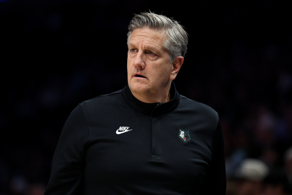 Minnesota Timberwolves head coach Chris Finch looks on during the first half of an NBA basketball game against the Sacramento Kings, Sunday, Dec. 14, 2025, in Minneapolis. (AP Photo/Matt Krohn)