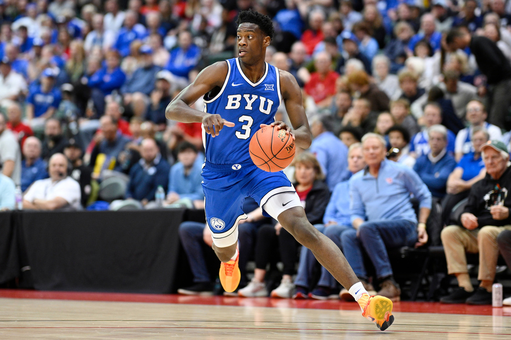 FILE - BYU forward AJ Dybantsa (3) drives to the basket against Dayton during the first half of an NCAA college basketball game, Friday, Nov. 28, 2025, in Kissimmee, Fla. (AP Photo/Phelan M. Ebenhack, File)