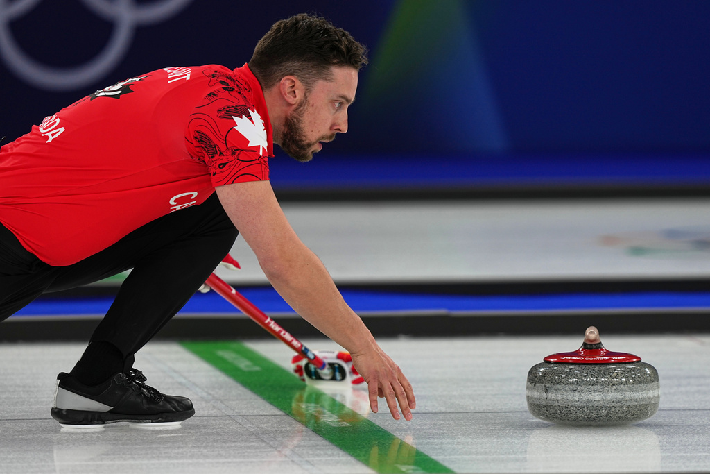 Canada Canada's Brett Gallant in action during the mixed doubles round robin phase of the curling competition against the Czech Republic, at the 2026 Winter Olympics, in Cortina d'Ampezzo, Italy, Wednesday, Feb. 4, 2026. (AP Photo/Fatima Shbair)