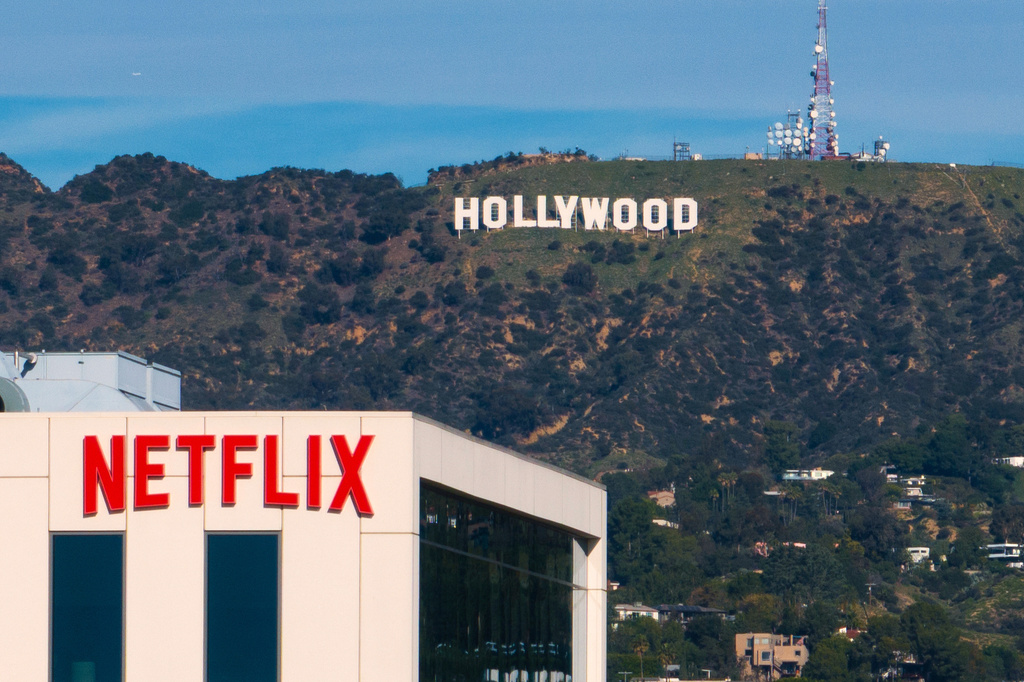 FILE - A Netflix sign is displayed atop a building in Los Angeles, on Dec. 18, 2025. (AP Photo/Jae C. Hong, File)