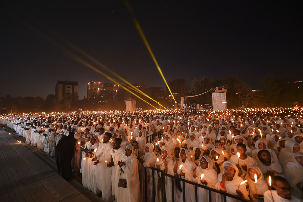 Ethiopian pilgrims pray during a Mass service for Ethiopian Christmas at the Bole Medhane Alem church in Addis Ababa, Ethiopia, Monday, Jan. 6, 2025. (AP Photo)