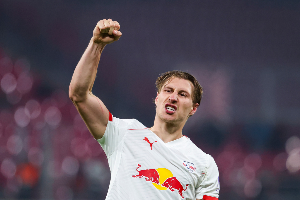 Leipzig's Willi Orban celebrates scoring during the Bundesliga soccer match between RB Leipzig and SC Freiburg in Leipzig, Germany, Wednesday Jan. 14, 2026. (Jan Woitas/dpa via AP)