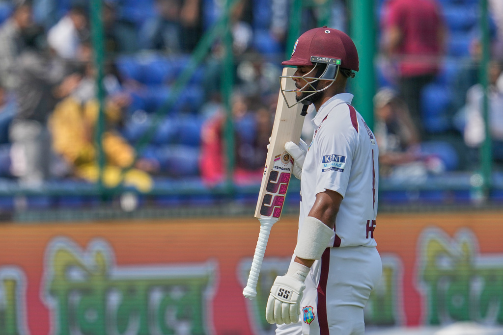 West Indies' Shai Hope walks off the field after losing his wicket on the fourth day of the second cricket test match between India and West Indies at the Arun Jaitley Stadium in New Delhi, India, Monday, Oct.13, 2025. (AP Photo/Manish Swarup)