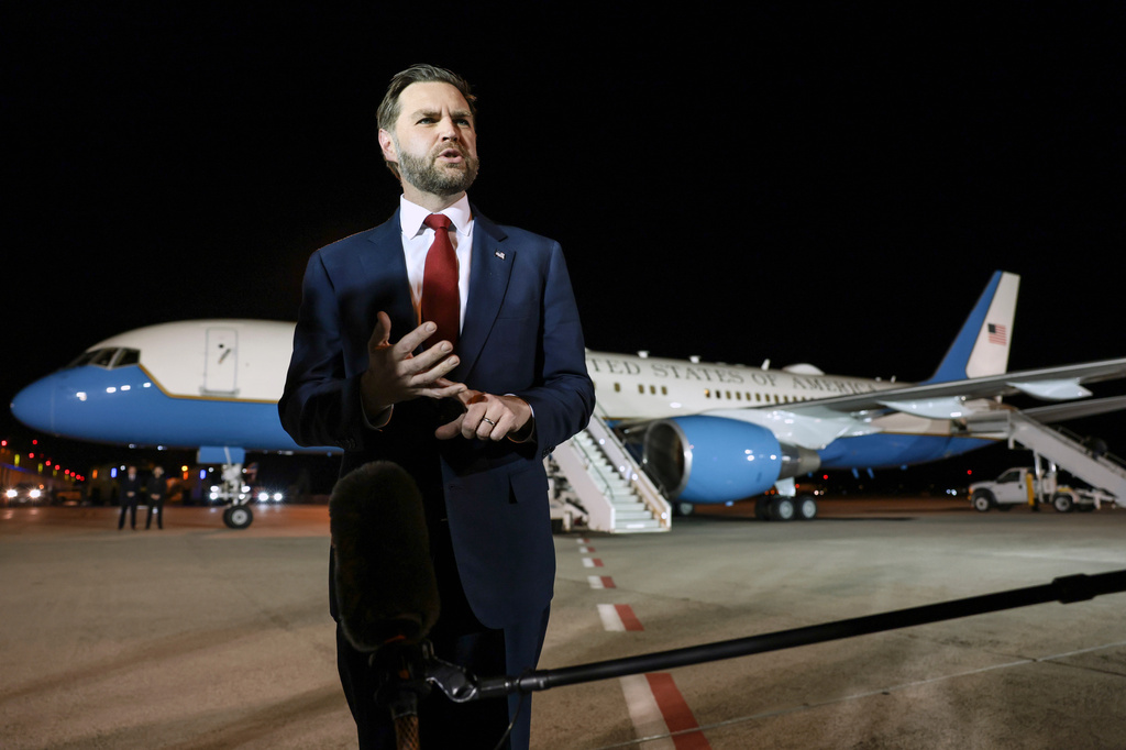Vice President JD Vance speaks to reporters before boarding Air Force Two to return to Washington, at Budapest Ferenc Liszt International Airport in Budapest, Hungary, Wednesday, April 8, 2026. (Jonathan Ernst/Pool via AP)