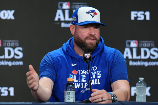 Toronto Blue Jays manager John Schneider talks to reporters at Yankee Stadium in New York, Monday, Oct. 6, 2025. (AP Photo/Seth Wenig) Toronto Blue Jays manager John Schneider talks to reporters at Yankee Stadium in New York, Monday, Oct. 6, 2025. (AP Photo/Seth Wenig)