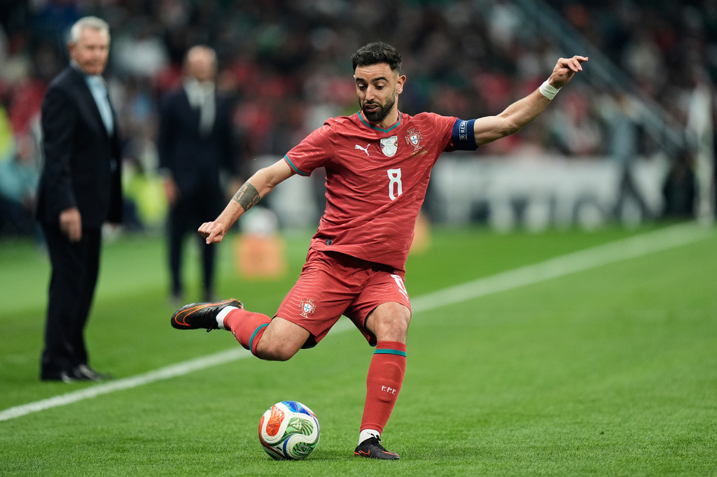FILE - Portugal's Bruno Fernandes passes the ball during the international friendly soccer match between Mexico and Portugal in Naucalpan, Mexico, Saturday, March 28, 2026. (AP Photo/Fernando Llano, File)