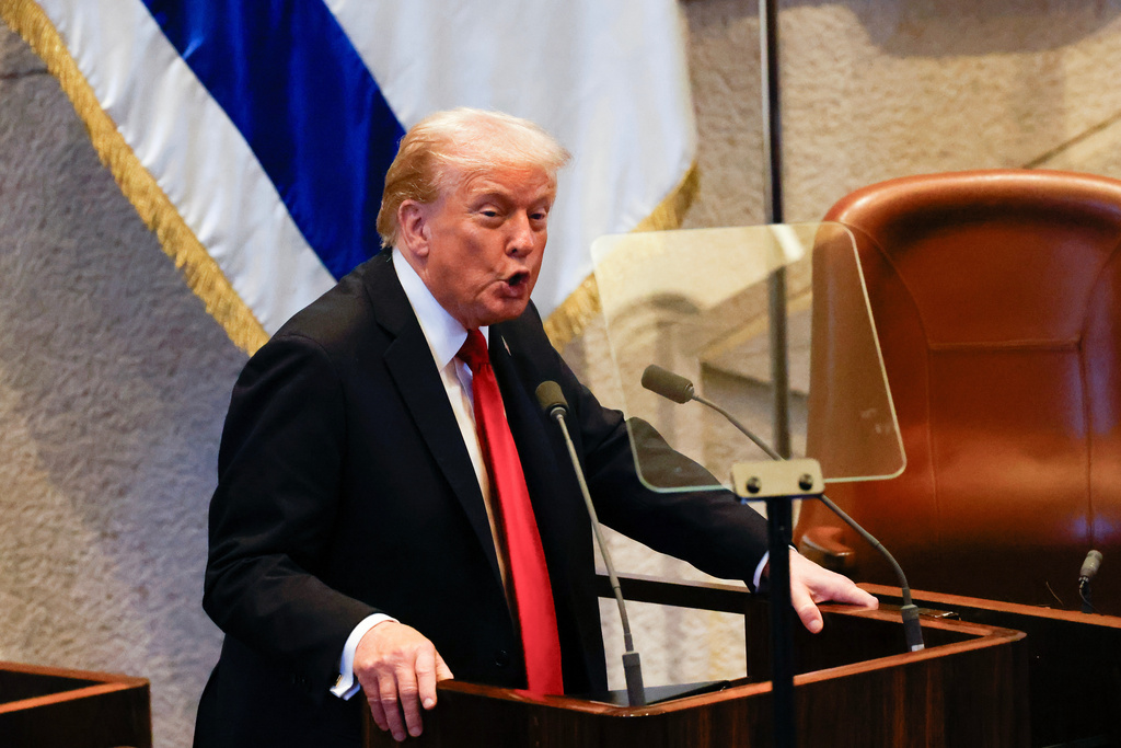 President Donald Trump addresses the Knesset, Israel's parliament, Monday, Oct. 13, 2025, in Jerusalem. (Jalaa Marey/Pool Photo via AP)