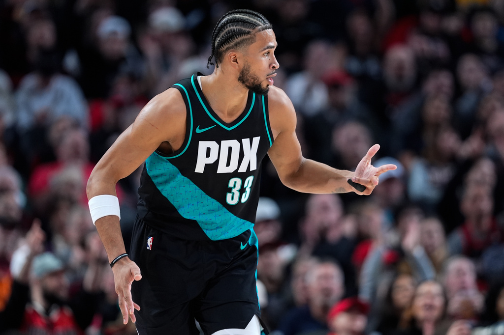 Portland Trail Blazers forward Toumani Camara reacts after making a 3-pointer during the first half of an NBA basketball game against the New Orleans Pelicans, Thursday, April 2, 2026, in Portland, Ore. (AP Photo/Jenny Kane)