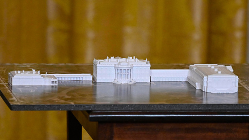A model is seen as President Donald Trump addresses a dinner for donors who have contributed to build the new ballroom at the White House, Wednesday, Oct. 15, 2025, in Washington. (AP Photo/John McDonnell) A model is seen as President Donald Trump addresses a dinner for donors who have contributed to build the new ballroom at the White House, Wednesday, Oct. 15, 2025, in Washington. (AP Photo/John McDonnell)
