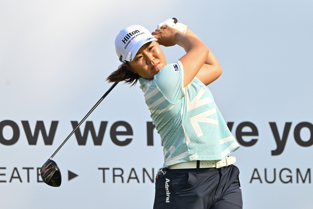 Nasa Hataoka, of Japan watches her tee shot on the 1st green during the first round of the LPGA Honda Thailand golf tournament in Pattaya, Thailand, Thursday, Feb. 19, 2026. (AP Photo/Kittinun Rodsupan)