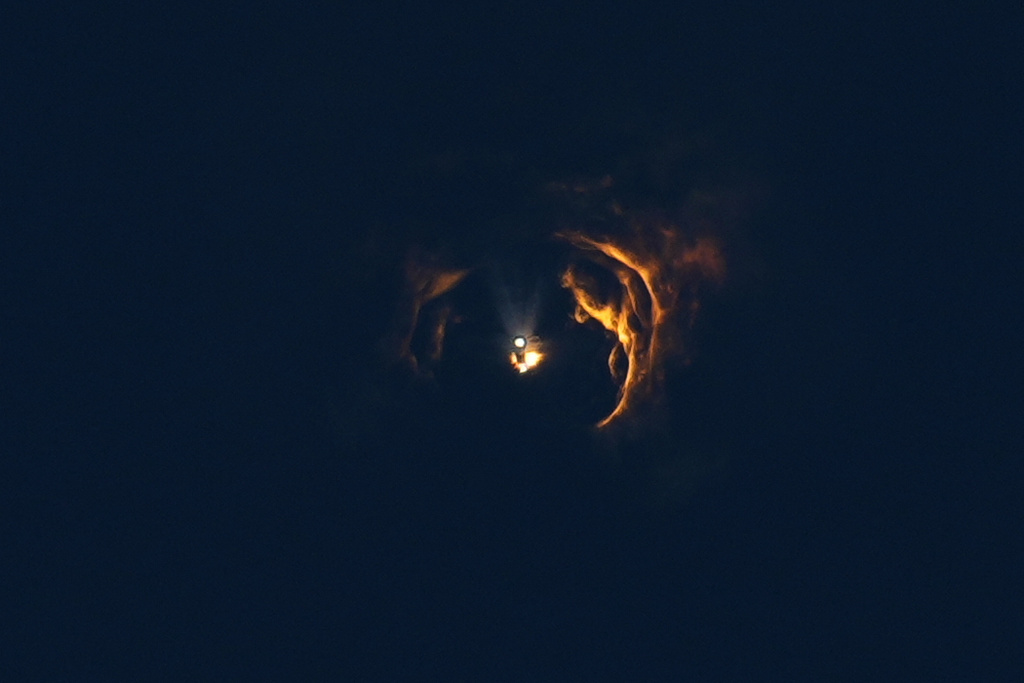 SpaceX's mega rocket and booster separate during a test flight from Starbase, Texas, Monday, Oct. 13, 2025. (AP Photo/Eric Gay)